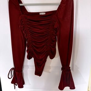Like new free people body suit